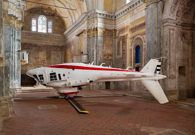 Paola pivi flips helicopter upside down inside 17th-century church in cremona, italy